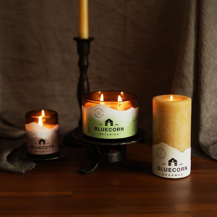 pure beeswax candles in glass and taper form