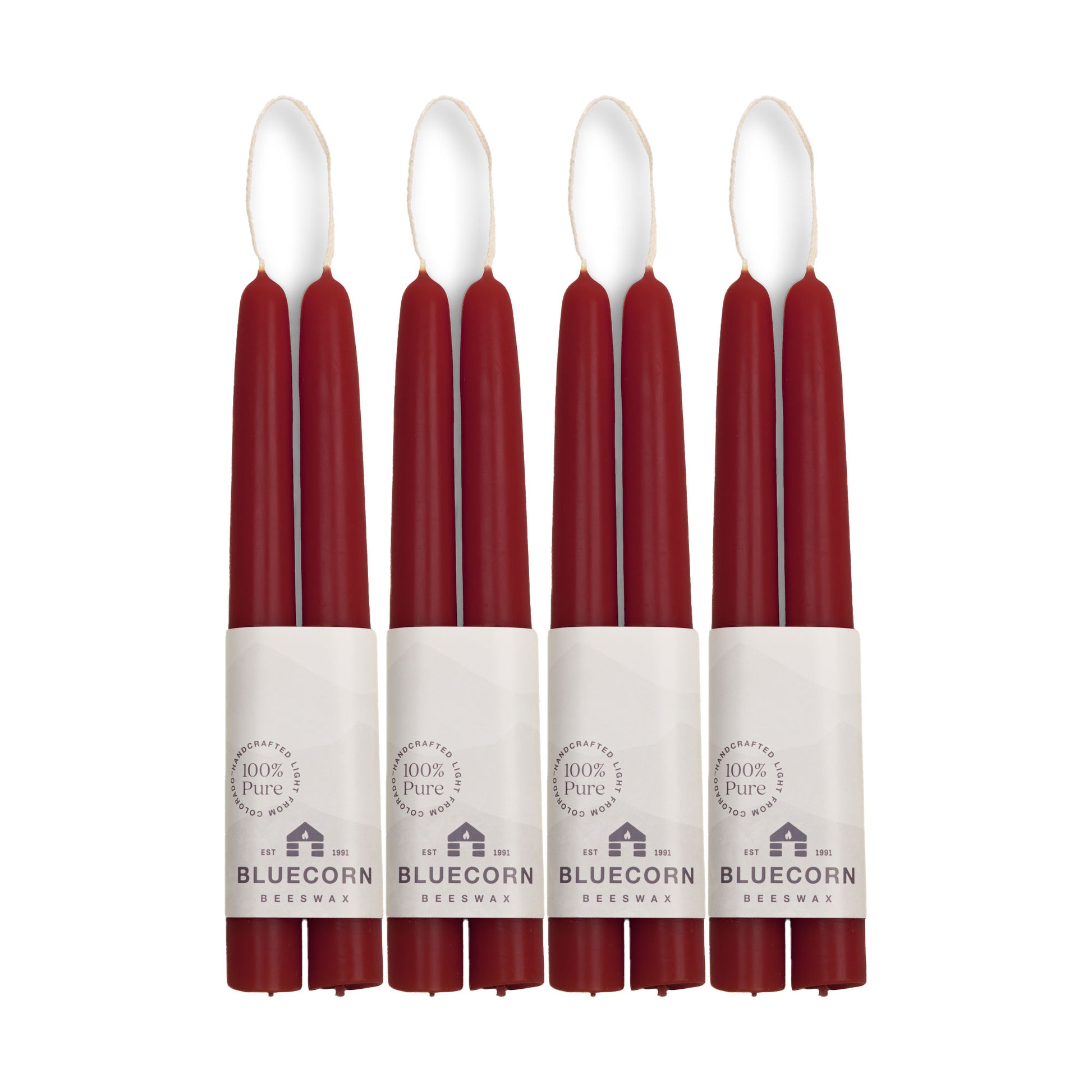 discounted bulk 8-pack of short, dark red beeswax tapers from bluecorn candles