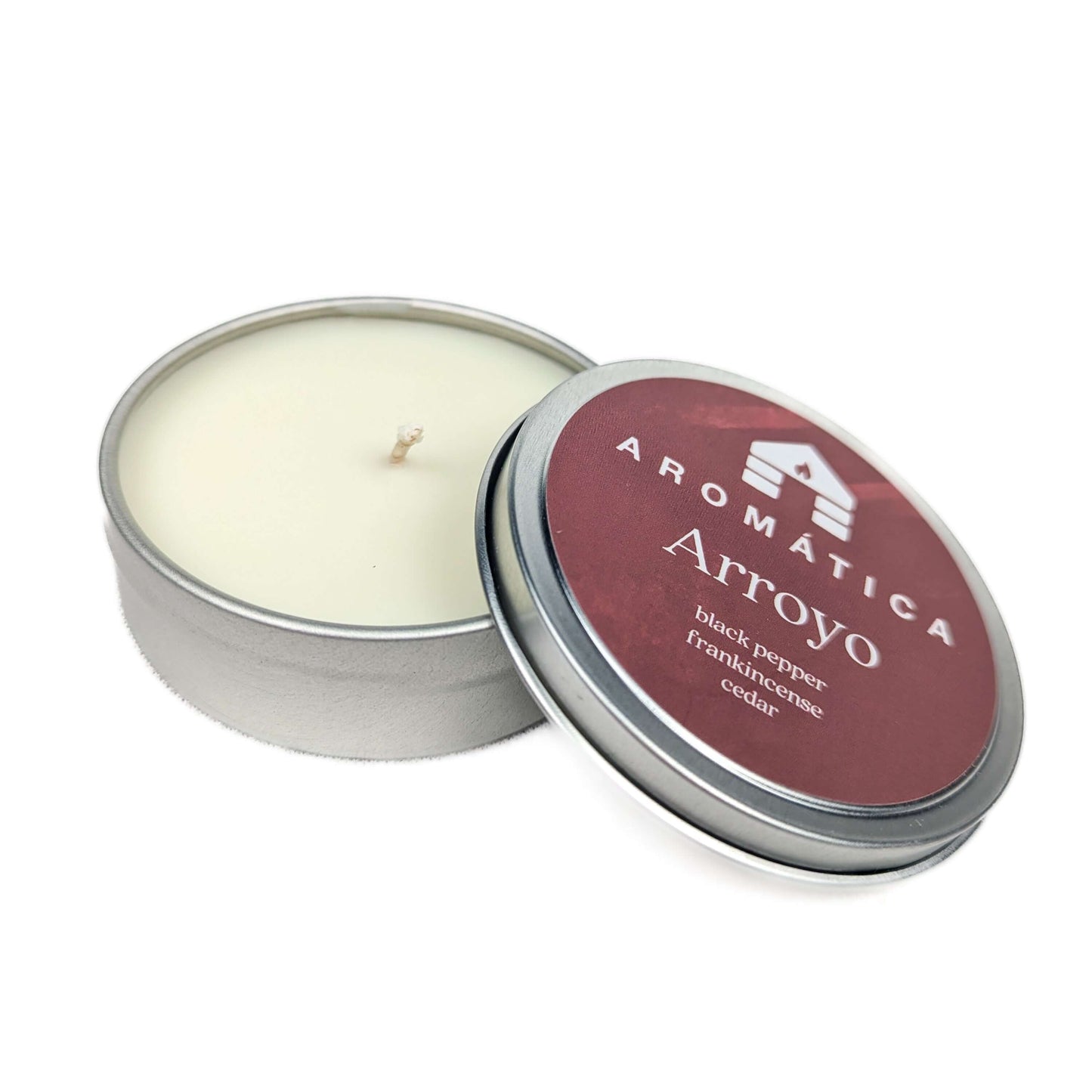 black pepper frankincense and cedar scented sample tin wax candle