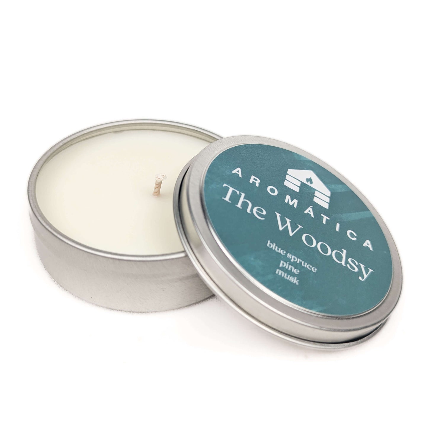 the woodsy. blue spruce pine and musk scented candle sample tin from bluecorn candles