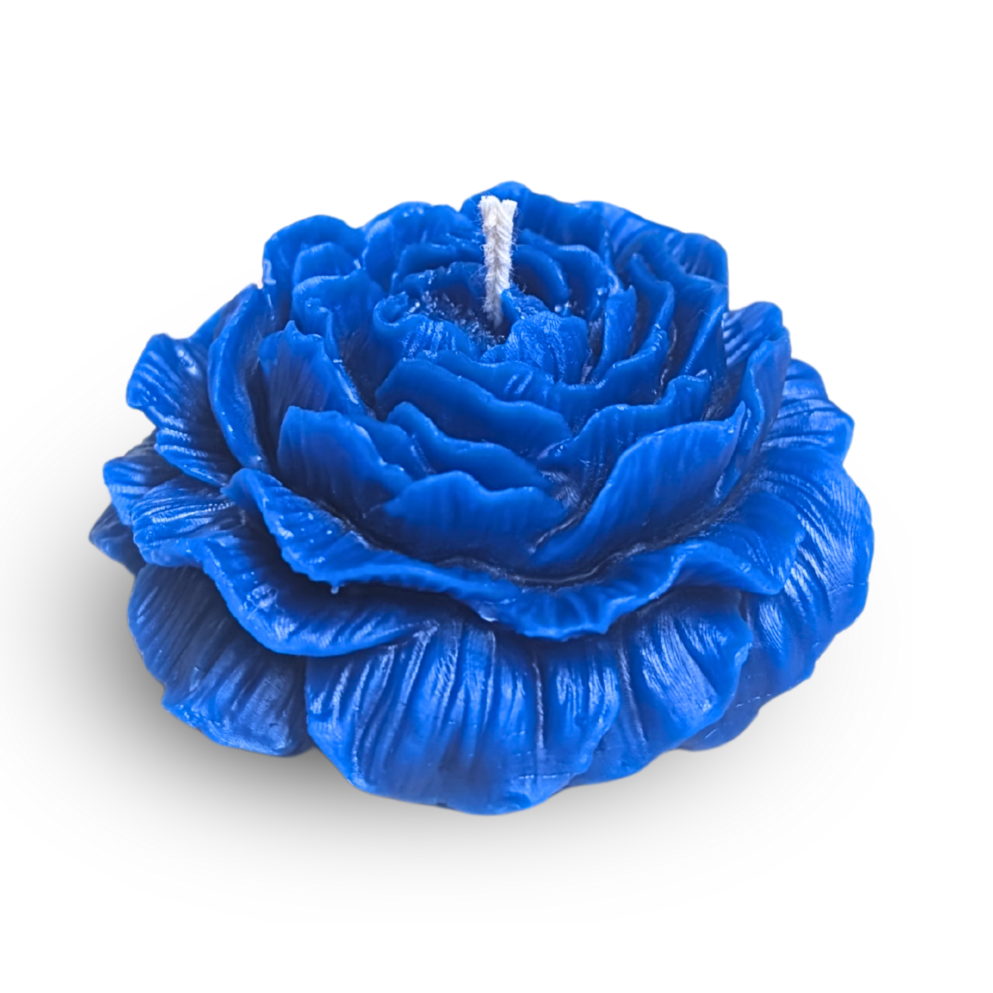 Blue rose-shaped candle on a white background