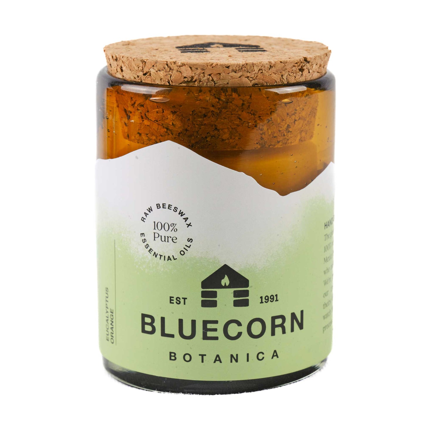scented candle made from beeswax and essential oils poured into blown glass bluecorn candles