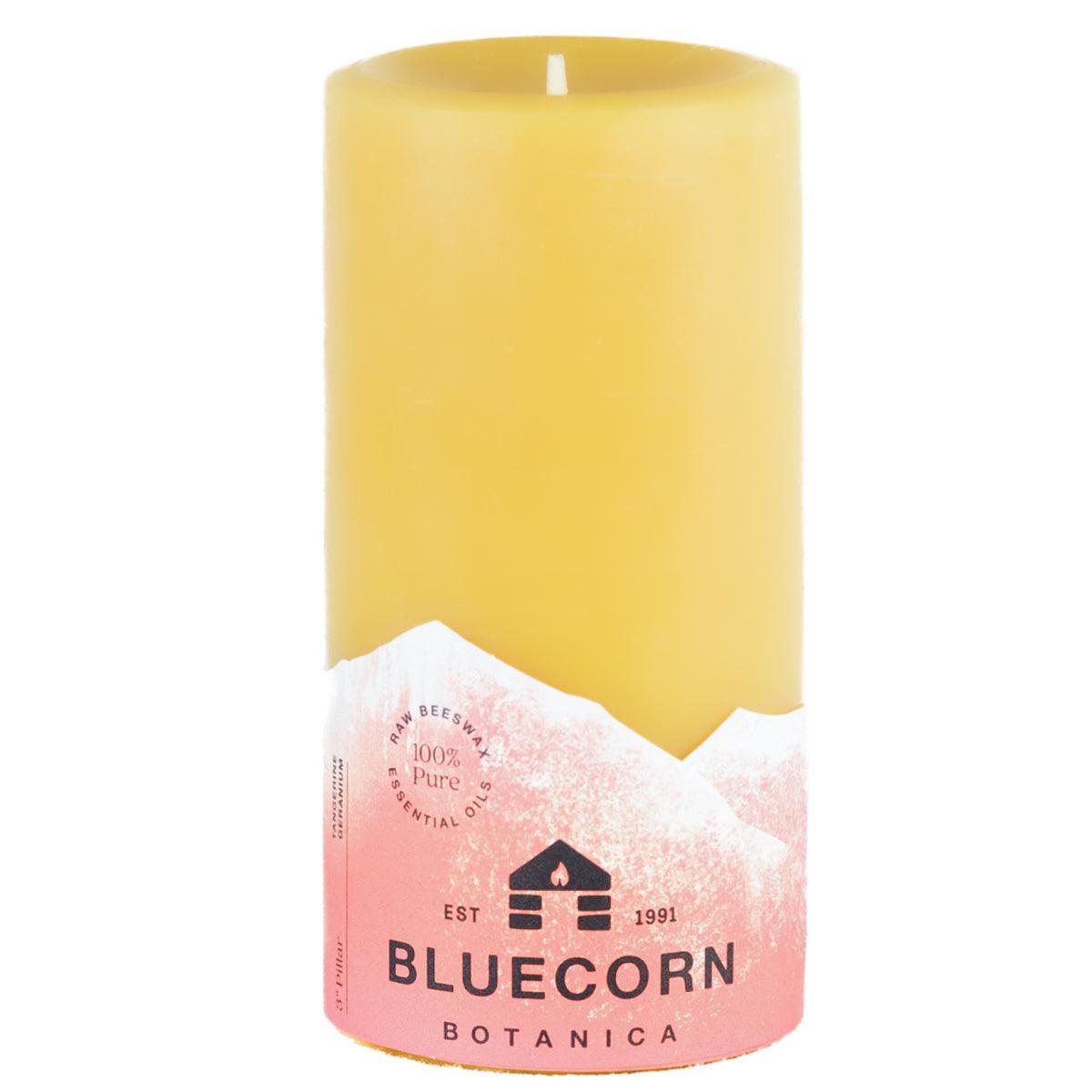 Bluecorn Botanica 100% Pure Beeswax Tangerine and Geranium 3" x 6" Scented Pillar Candle. Burn Time: 90 hours. Made with 100% Pure Beeswax, 100% Pure Essential Oils, and a 100% pure cotton wick, no lead. Candles are paraffin free, clean burning and non-toxic. Features Bluecorn Botanica label in Orange printed on 100% recycled paper. Wax is golden in color.