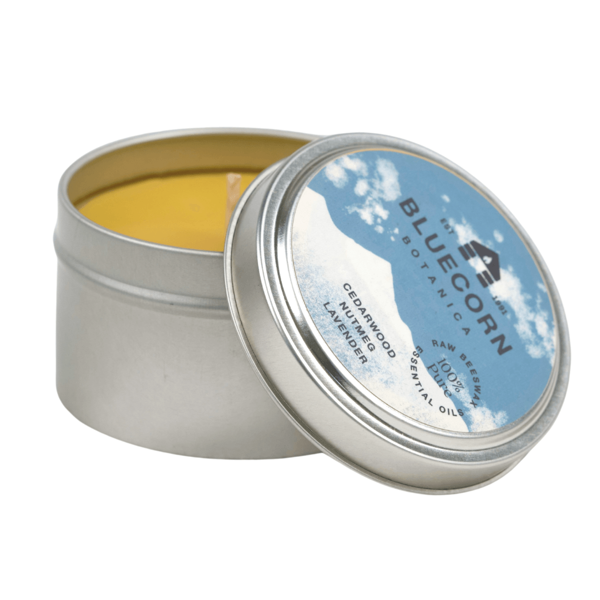 Bluecorn Botanica Cedarwood, Nutmeg and Lavender 100% Pure Beeswax Travel Tin Candle. Burn Time: 6oz Candle: 30 Hours. 2oz Candle 12 Hours. Made with 100% Pure Beeswax and 100% Pure Essential Oils. Made with 100% pure cotton wick, no lead and paraffin free. Clean burning and non-toxic. Features Bluecorn Botanica Label in recyclable aluminum tin. Perfect for travel, camping and gifts.