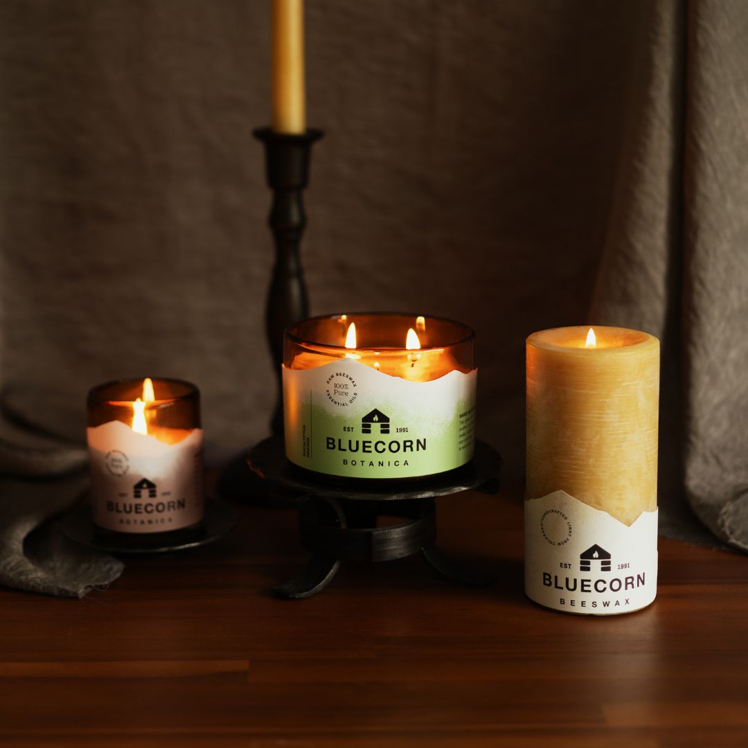 pure beeswax candles in glass and taper form 