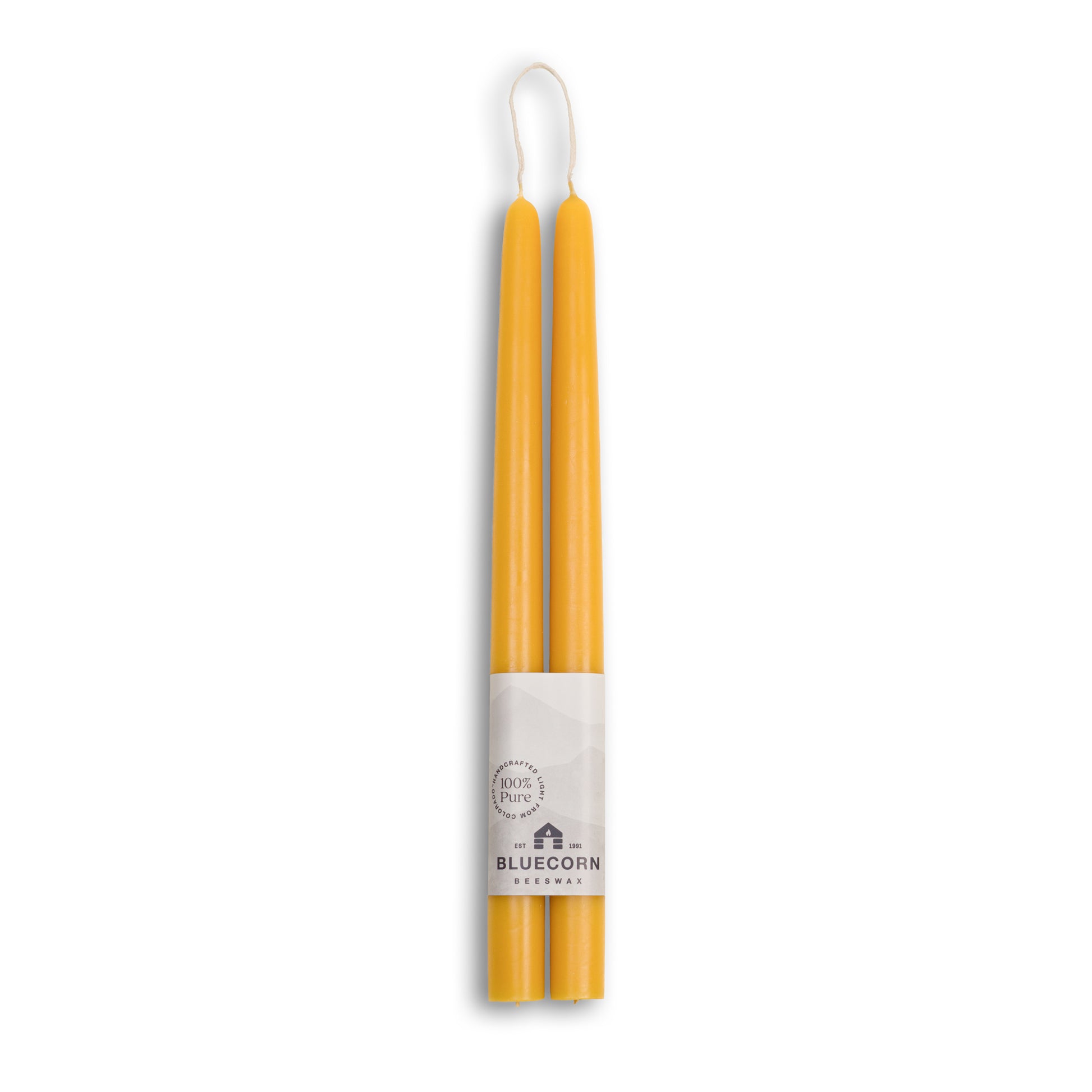 Pure beeswax taper candles from Bluecorn Candles. Pair of 12" long candlesticks. Yellow tapered candles. Natural, non toxic candles.