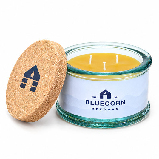 three wick beeswax candle in aqua spanish glass with bluecorn beeswax logo and cork lid