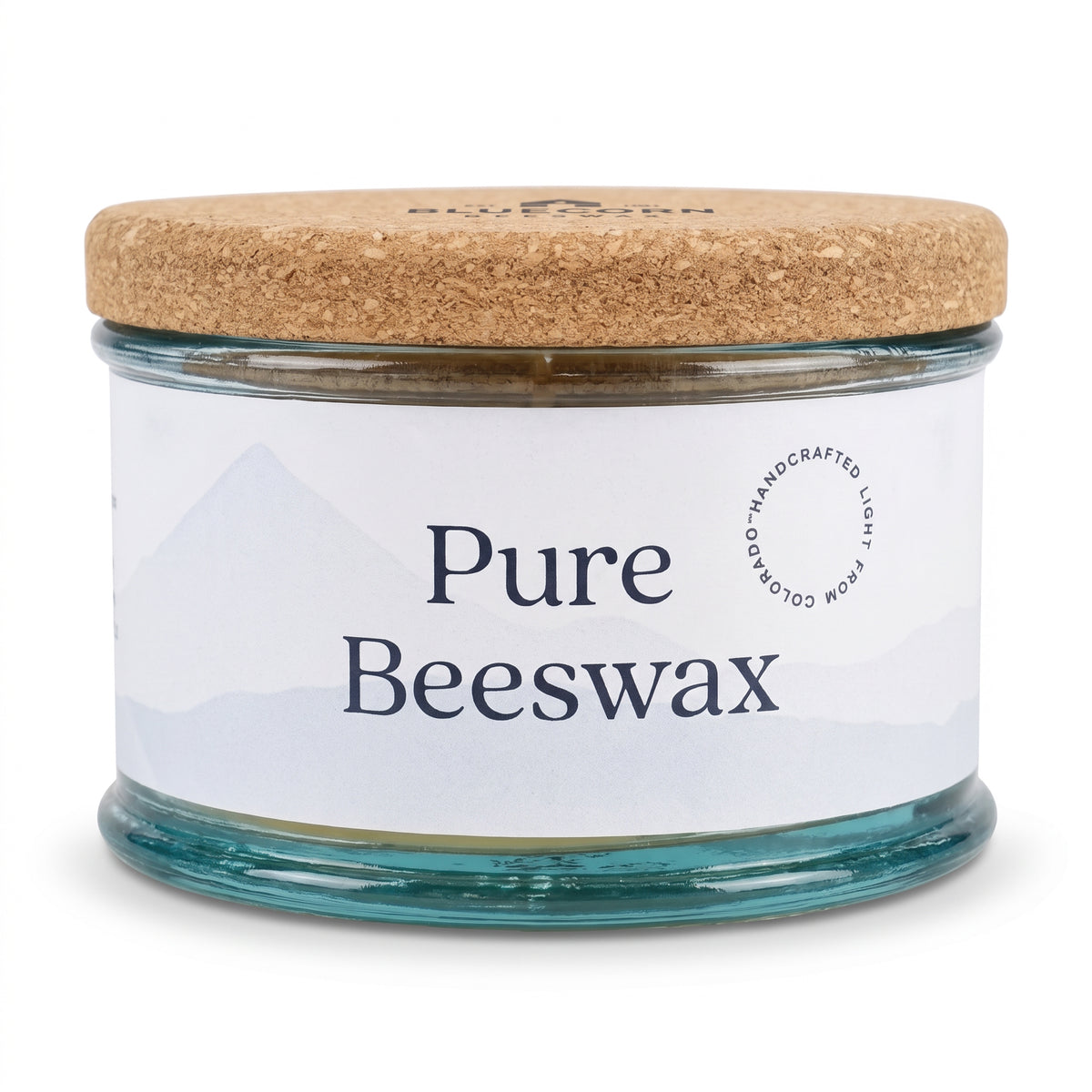 pure beeswax candle in aqua colored handmade spanish glass holder by bluecorn beeswax