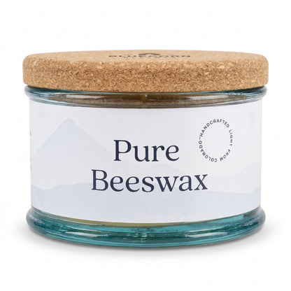 pure beeswax candle in aqua colored handmade spanish glass holder by bluecorn beeswax