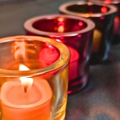 beeswax tea lights in recycled glass candle holders