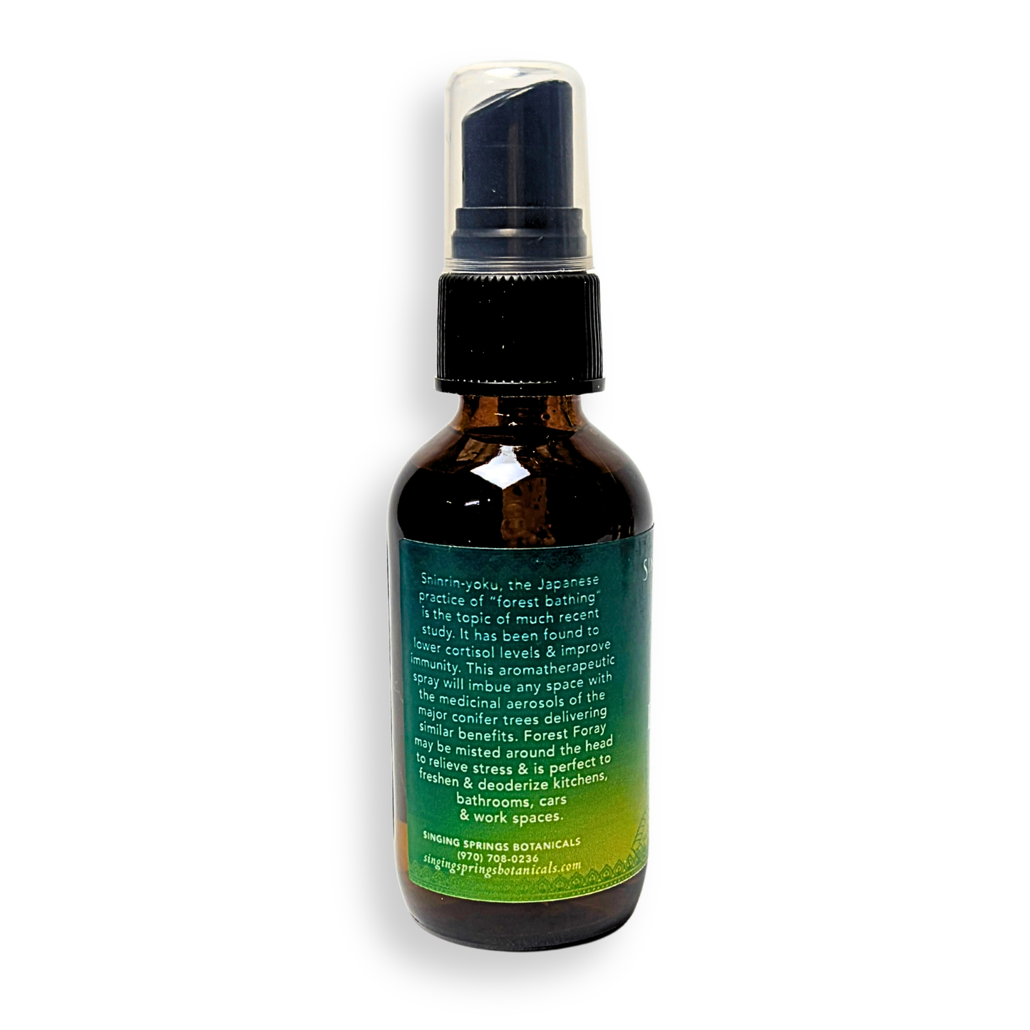 Brown spray bottle with a label on a white background