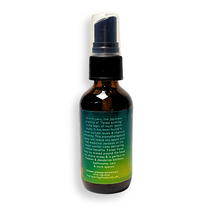 Brown spray bottle with a label on a white background