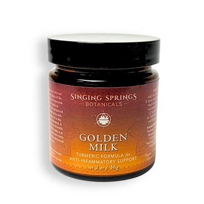 Jar of Singing Springs Botanicals Golden Milk on a white background