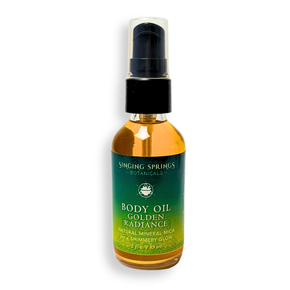 Bottle of Singing Springs Botanicals Body Oil Golden Radiance on a white background