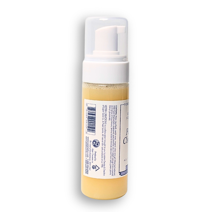 Foam bottle with a white cap on a white background