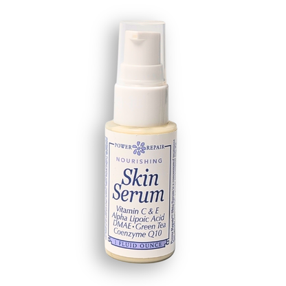 Skin serum bottle with label on a white background