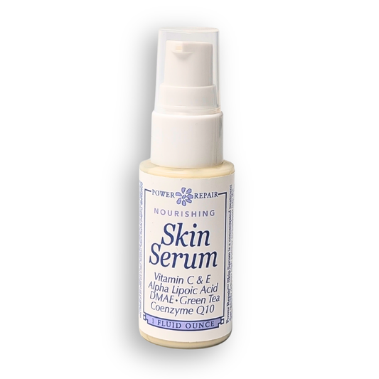 Skin serum bottle with label on a white background