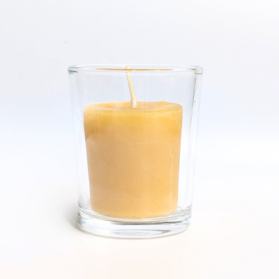 bluecorn beeswax votive in clear glass votive candle holder