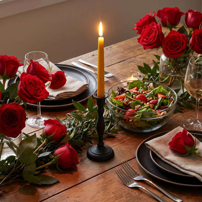 dining table with pure beeswax taper candle 