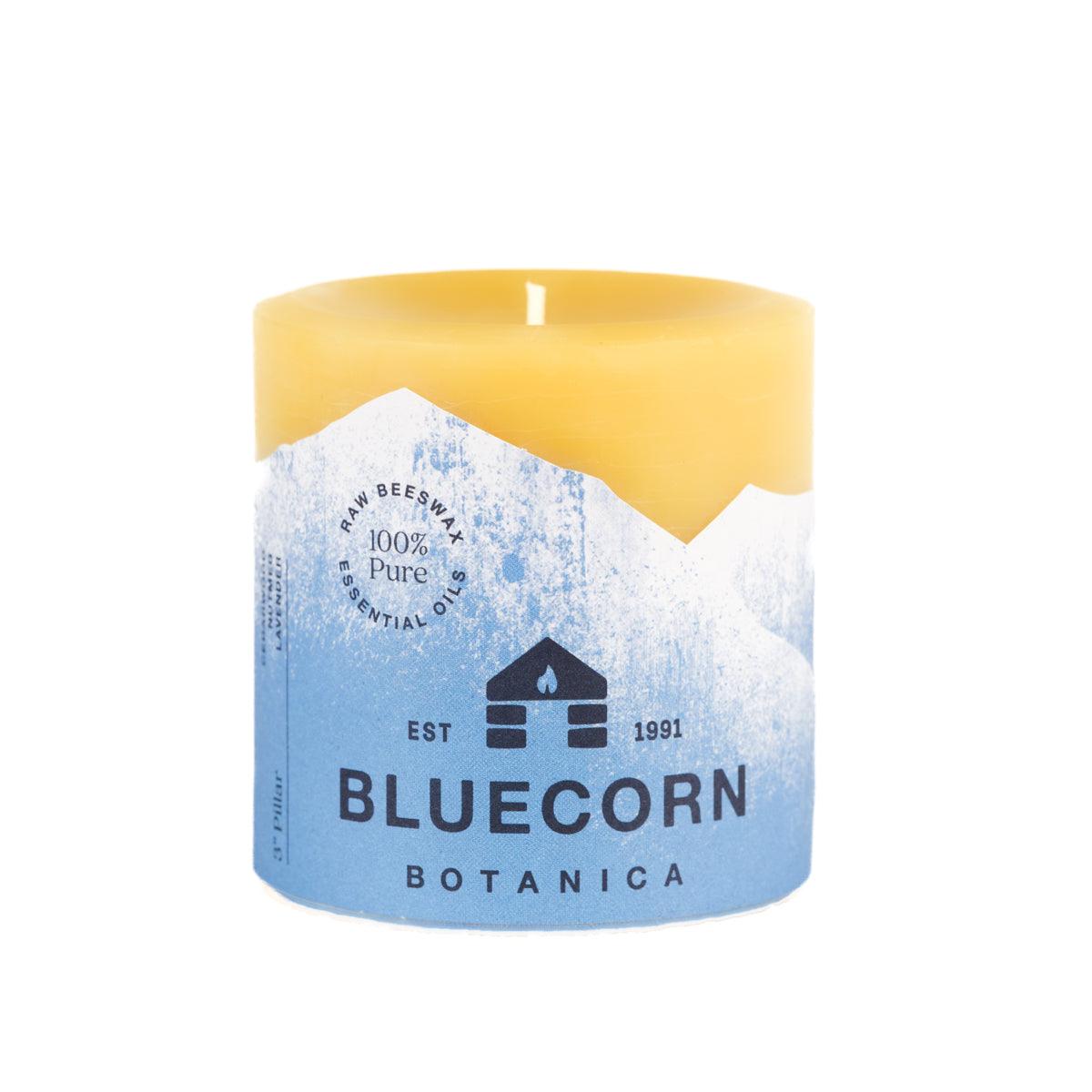 Bluecorn Botanica 100% Pure Beeswax Cedarwood, Nutmeg and Lavender  3" x 3" Scented Pillar Candle. Burn Time: 50 hours. Made with 100% Pure Beeswax, 100% Pure Essential Oils, and a 100% pure cotton wick, no lead. Candles are paraffin free, clean burning and non-toxic. Features Bluecorn Botanica label in Blue printed on 100% recycled paper. Wax is golden in color. 