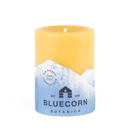 Bluecorn Botanica 100% Pure Beeswax Cedarwood, Nutmeg and Lavender  3" x 4" Scented Pillar Candle. Burn Time: 60 hours. Made with 100% Pure Beeswax, 100% Pure Essential Oils, and a 100% pure cotton wick, no lead. Candles are paraffin free, clean burning and non-toxic. Features Bluecorn Botanica label in Blue printed on 100% recycled paper. Wax is golden in color. 
