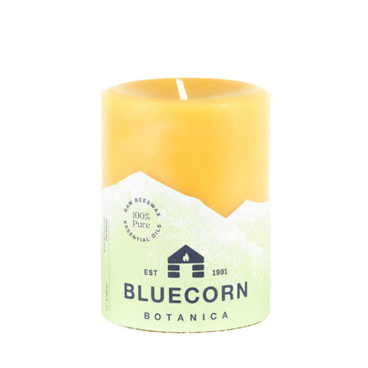 Bluecorn Botanica 100% Pure Beeswax Eucalyptus & Orange 3" x 4" Scented Pillar Candle. Burn Time: 60 hours. Made with 100% Pure Beeswax, 100% Pure Essential Oils, and a 100% pure cotton wick, no lead. Candles are paraffin free, clean burning and non-toxic. Features Bluecorn Botanica label in Green printed on 100% recycled paper. Wax is golden in color.