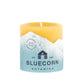 Bluecorn Botanica 100% Pure Beeswax Spruce 3" x 3"  Scented Pillar Candle. Burn Time: 50 hours. Made with 100% Pure Beeswax, 100% Pure Essential Oils, and a 100% pure cotton wick, no lead. Candles are paraffin free, clean burning and non-toxic. Features Bluecorn Botanica label in Forest Green printed on 100% recycled paper. Wax is golden in color. 