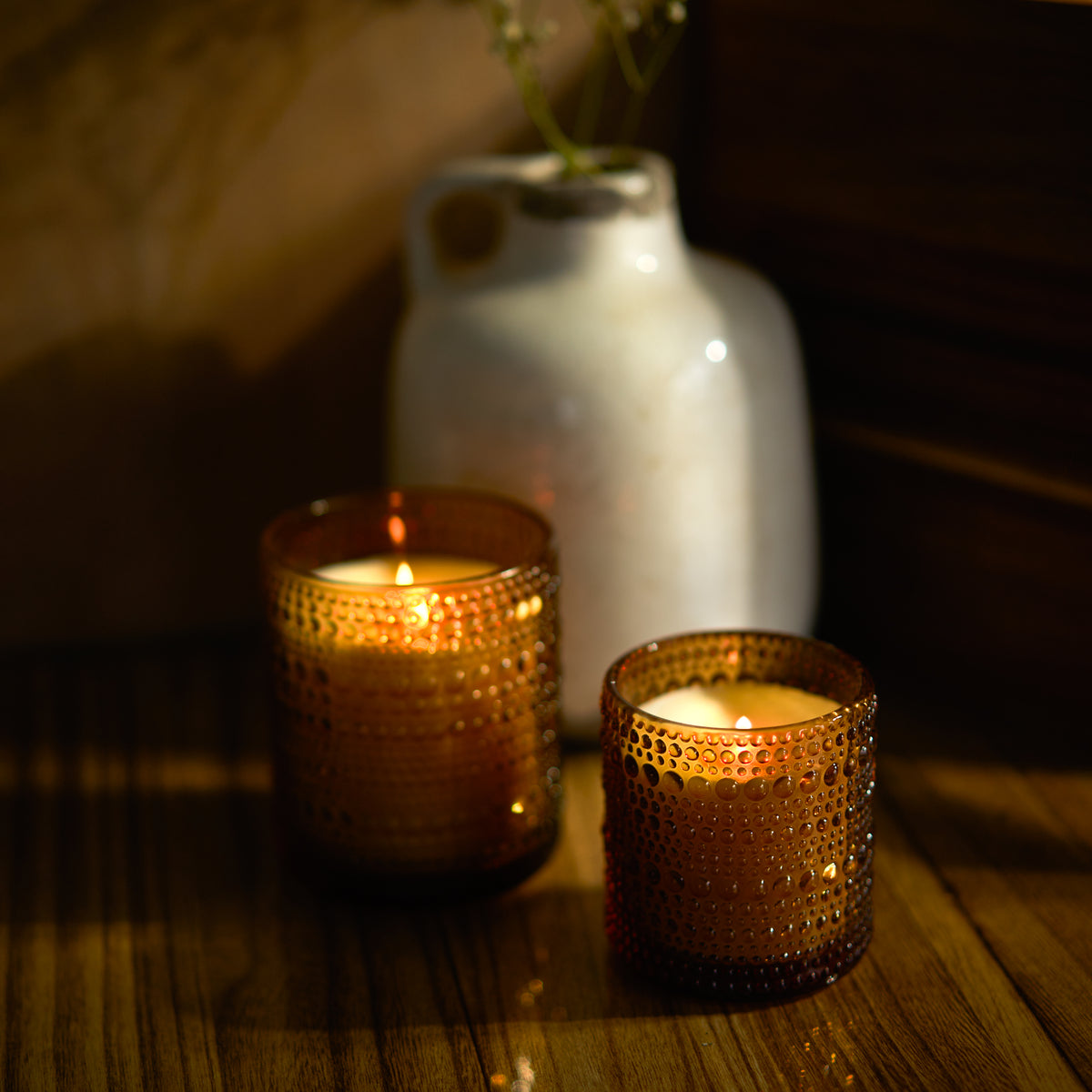 unscented coconut wax candles in refillable amber glass jars by bluecorn candles