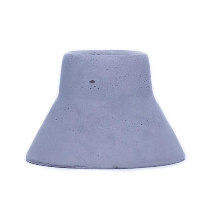 Charcoal colored concrete taper candle holder. Candle holder measures 3" at the base and narrows toward the top to fit a beeswax taper candle. 