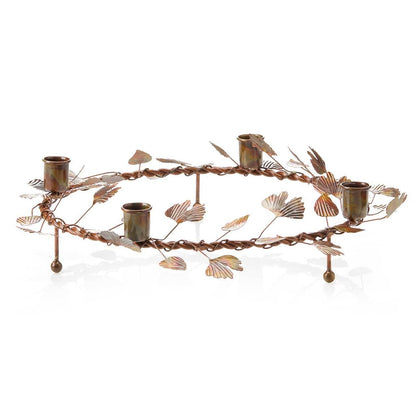 Bronze patina ginkgo Advent wreath shown from the side on a white background with empty taper holders