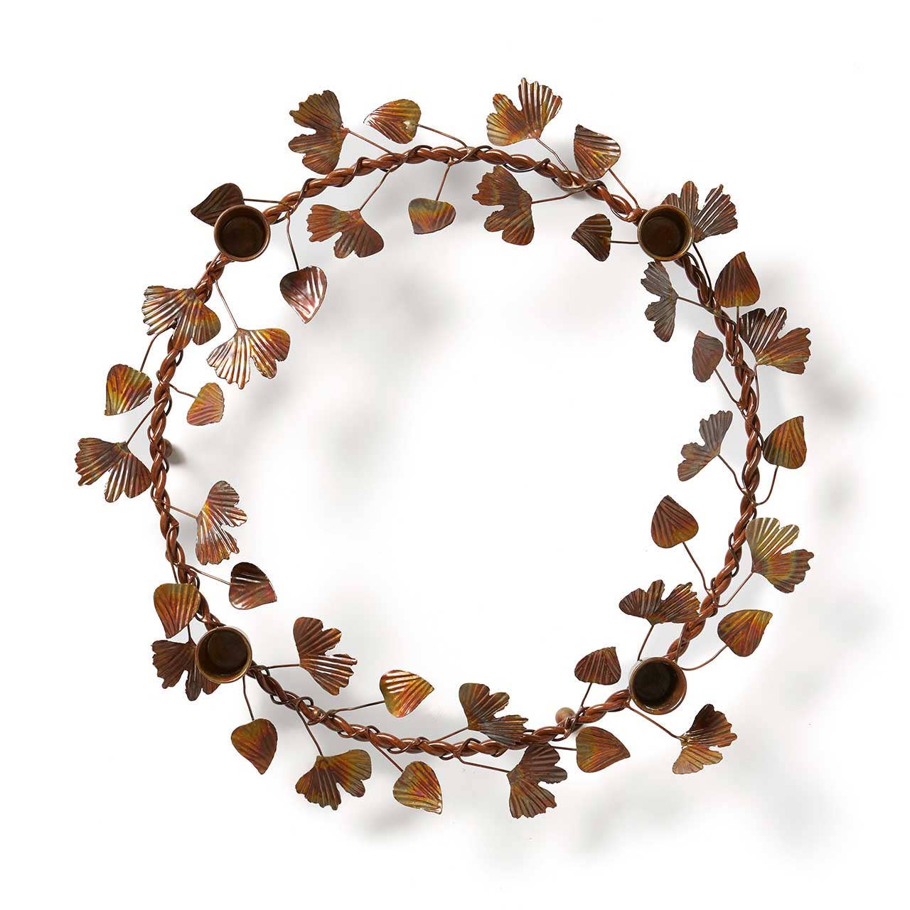Bronze patina ginkgo Advent taper candle holder displayed in a top‑view product photo without candles