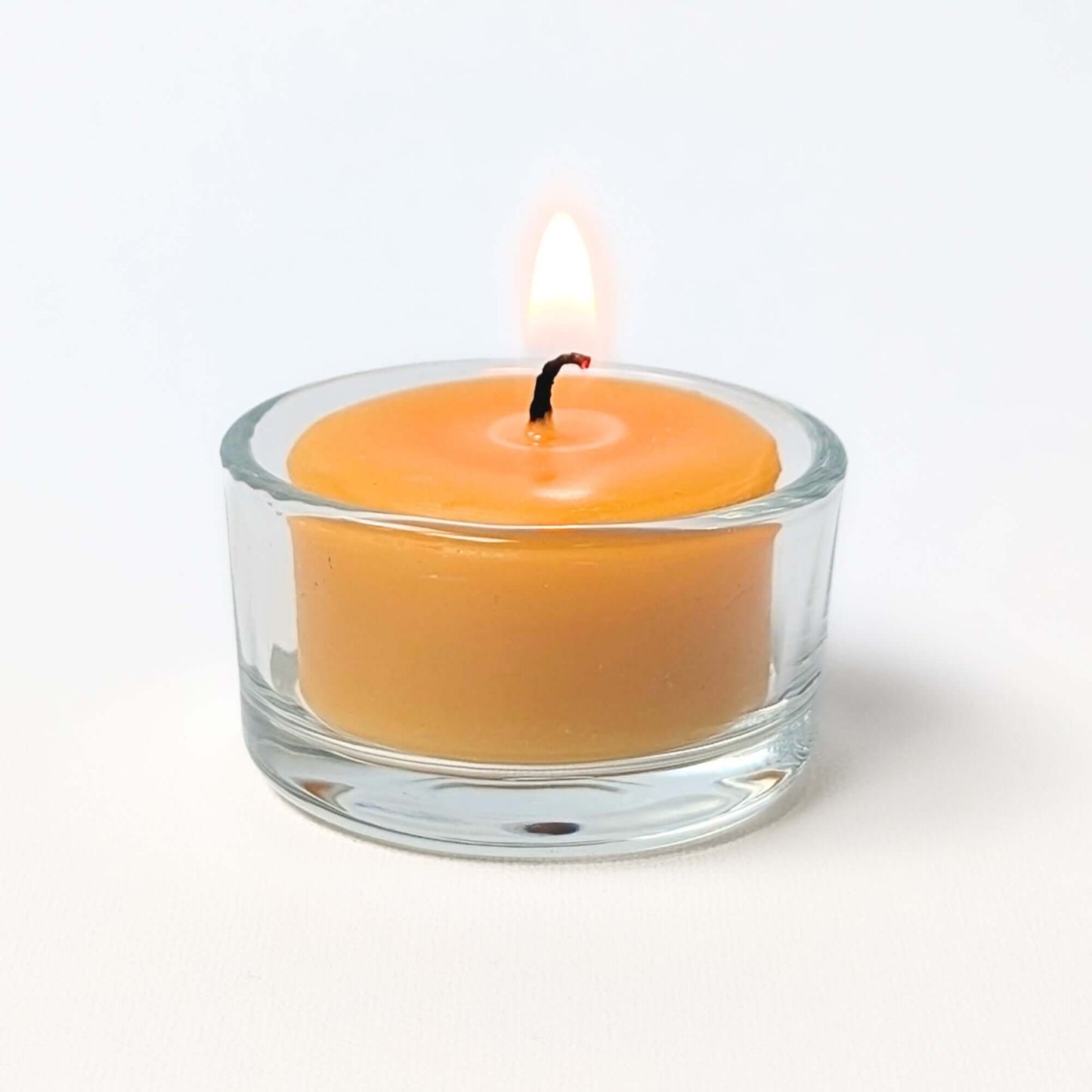 Plastic-free beeswax tea light refills in refillable glass cups