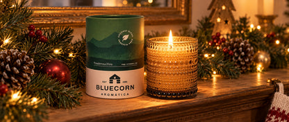 pine scented candle from Bluecor candles on Christmas mantel