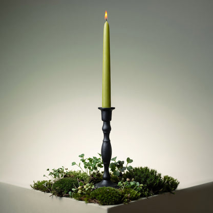 light green taper candle made of pure beeswax