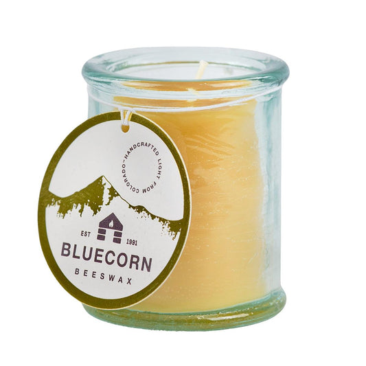 Bluecorn Beeswax 100% Pure Beeswax 4.4oz glass candle. Glass is watery aqua in color and wax is golden in color. Made with 100% pure cotton wick, no lead and paraffin free. Clean burning and non-toxic. Burn Time: 30 Hours. Made off 100% recycled glass featuring Bluecorn Tag with logo. Refill with votives or Tea Lights.  