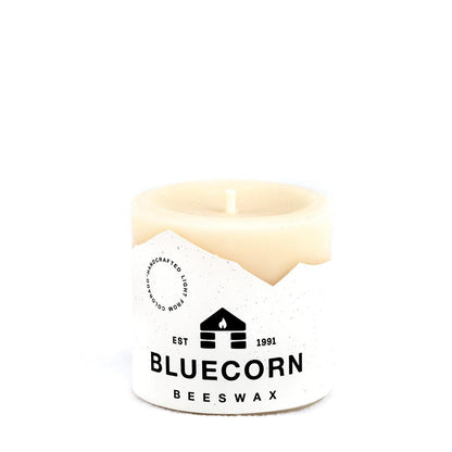 Bluecorn Beeswax 100% Pure Beeswax 3" x 3" Ivory Pillar Candle. Burn Time: 50 hours. Made with 100% Pure Beeswax, is white in color. Made with 100% pure cotton wick, no lead and paraffin free. Clean burning and non-toxic. Features Bluecorn Beeswax label printed on 100% recycled paper.