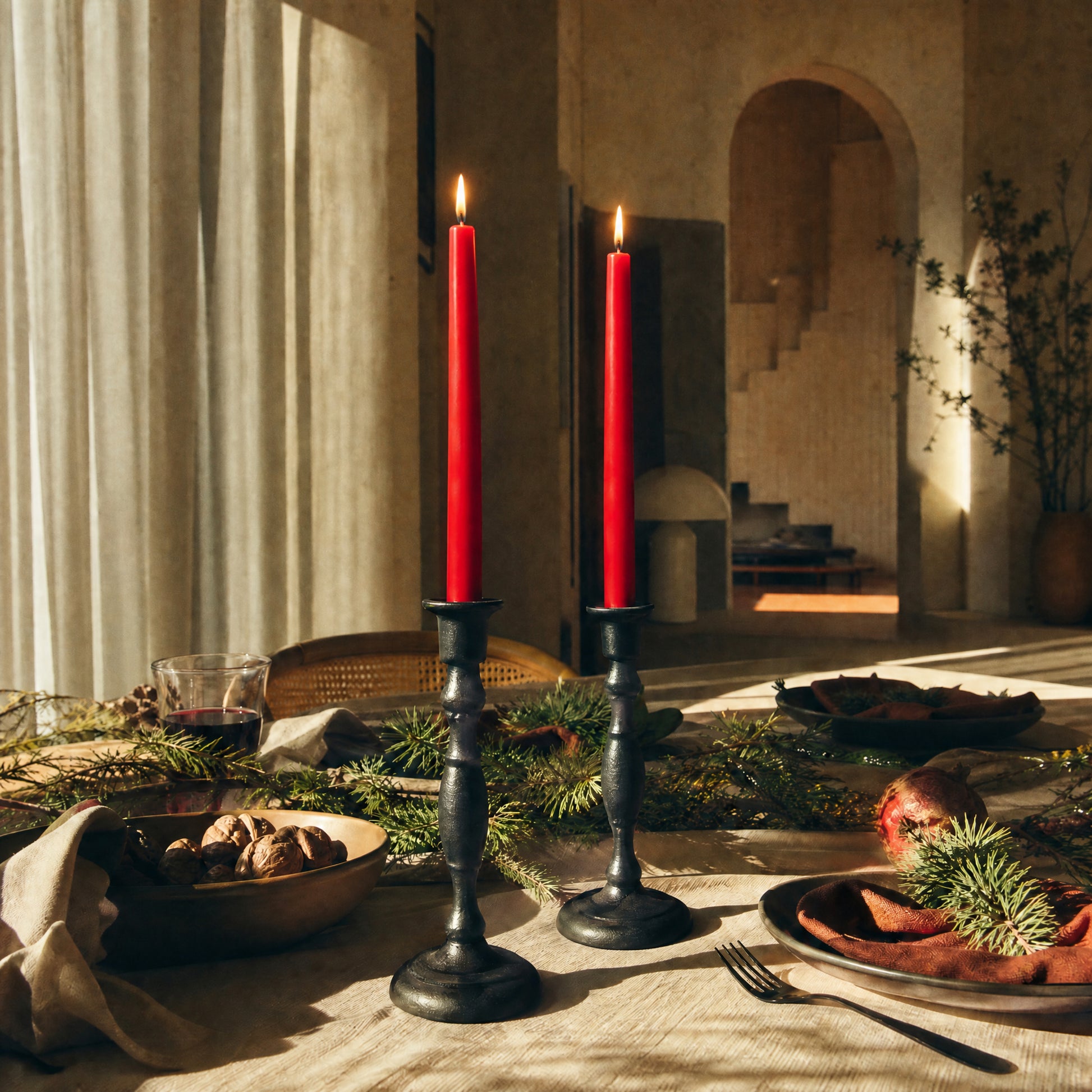 red beeswax taper candles on a holiday dining table bluecorn candles
