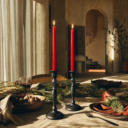 red beeswax taper candles on a holiday dining table bluecorn candles