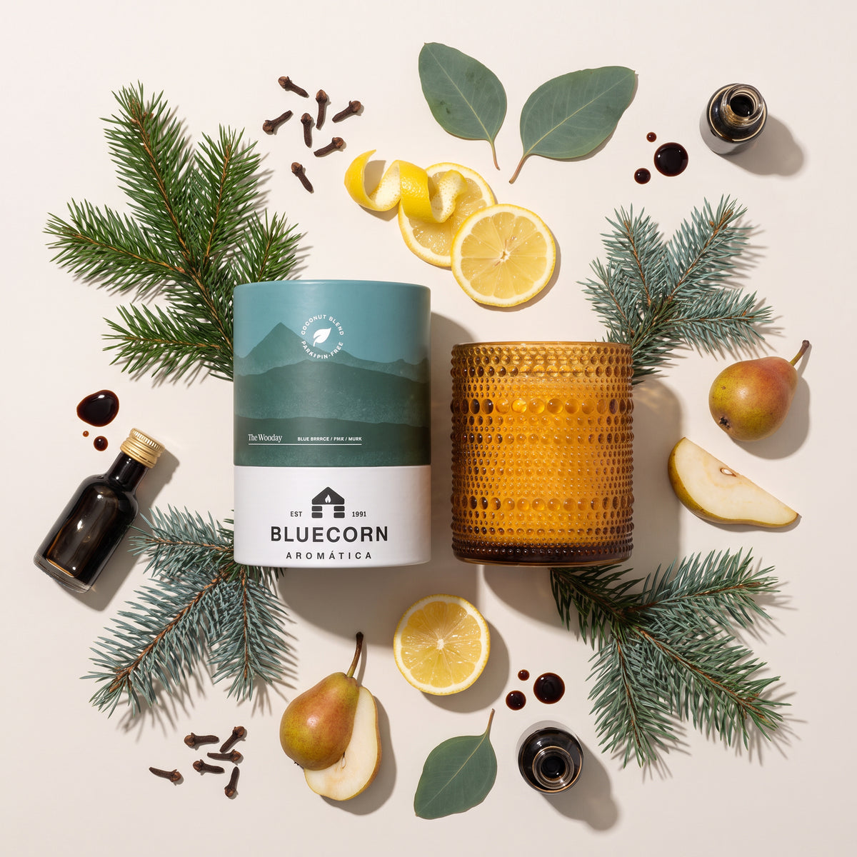 woodsy pine scented candle from bluecorn with scent components of lemon, sage, pear and tonka 
