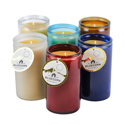 Group of Bluecorn Beeswax 100% Pure Beeswax 16oz recycled heavy glass candle. Colors are Red, Cobalt, Dark Amber, Aqua, Clear and Frosted. Wax is golden in color and glass is made with 50% post-consumer recycled glass. Each candle will burn for 80 hours. Candles in the clearance section may have a scratch or blemish, but nothing that will impact the burn. 